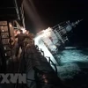 Tàu hộ vệ HTMS Sukhothai bị nghiêng sau khi nước tràn vào thân ở ngoài khơi tỉnh Prachuap Khiri Khan, Thái Lan đêm 18/12/2022. (Ảnh: AFP/TTXVN)
