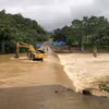 Nước sông dâng cao tại cầu tràn thôn Trăng tà Puồng, xã Hướng Lập (huyện Hướng Hóa, tỉnh Quảng Trị). (Ảnh: TTXVN phát) 