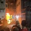 Vụ cháy nhà trong hẻm 497 đường Thống Nhất, phường 16, quận Gò Vấp khiến 3 mẹ con tử vong. (Ảnh TTXVN phát)