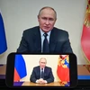 Tổng thống Nga Vladimir Putin phát biểu trên truyền hình toàn quốc, tuyên bố quốc tang sau vụ tấn công khủng bố tại nhà hát Crocus City Hall ở Moskva, ngày 23/3/2024. (Ảnh: THX/TTXVN)