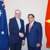 Thủ tướng Phạm Minh Chính gặp Thủ tướng Australia Anthony Albanese. (Ảnh: Dương Giang/TTXVN)