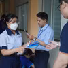 Thí sinh chuẩn bị vào phòng thi tại điểm thi đánh giá năng lực tại Trường Đại học Khoa học Tự nhiên, Đại học Quốc gia Thành phố Hồ Chí Minh. (Ảnh: Thu Hoài/TTXVN)