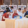 Thành viên Hội đồng chung khảo Giải Báo chí Quốc gia lần thứ 18 năm 2023 tham dự. (Ảnh: Minh Quyết/TTXVN)