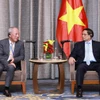 Thủ tướng Phạm Minh Chính tiếp ông Nghiêm Giới Hòa, Nhà sáng lập Tập đoàn Xây dựng Thái Bình Dương. (Ảnh: Dương Giang/TTXVN)