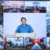 Thủ tướng chủ trì hội nghị trực tuyến với các địa phương để đánh giá thiệt hại và khắc phục hậu quả cơn bão số 3. (Ảnh: Dương Giang/TTXVN)