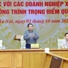 Thủ tướng Phạm Minh Chính chủ trì làm việc với các doanh nghiệp xây dựng. (Ảnh: Dương Giang/TTXVN)