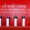 Chủ tịch Quốc hội Vương Đình Huệ và các đại biểu thực hiện nghi thức khởi công dự án Nhà ở xã hội Tràng Cát-Hải Phòng. (Ảnh: Nhan Sáng/TTXVN)