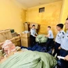 Một vụ phát hiện nhiều lô hàng giả, gian lận thương mại. (Ảnh: Nguyên Linh/TTXVN)