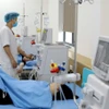 Các công nhân nhập viện do ngộ độc thực phẩm được điều trị tại Bệnh viện Hữu nghị Lạc Việt, tỉnh Vĩnh Phúc. (Ảnh: Hoàng Hùng/TTXVN)