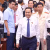Chủ tịch Quốc hội Trần Thanh Mẫn đến dự khai mạc Kỳ họp thứ 18, Hội đồng nhân dân thành phố Hải Phòng khóa XVI, nhiệm kỳ 2021-2026. (Ảnh: Văn Điệp/TTXVN)