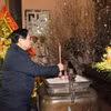 Thủ tướng Phạm Minh Chính dâng hương tưởng niệm Chủ tịch Hồ Chí Minh ở Thanh Hóa. (Ảnh: Dương Giang/TTXVN)