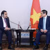 Thủ tướng Phạm Minh Chính tiếp ông Gautam Adani, Chủ tịch Tập đoàn Adani (Ấn Độ). (Ảnh: Dương Giang/TTXVN)