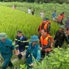Lực lượng cứu hộ đã tìm được 2 thi thể: N.H.V (22 tuổi) và N.K.L (20 tuổi) bị lũ ống cuốn trôi tại xã Đạo Trù huyện Tam Đảo. (Ảnh: TTXVN phát)