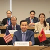 Phó Thủ tướng Chính phủ Lê Minh Khái trao đổi trực tuyến với Đại diện Thương mại Hoa Kỳ Katherine Tai. (Ảnh: Thanh Tuấn/TTXVN)