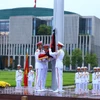 Lễ thượng cờ rủ Quốc tang. (Ảnh: Minh Quyết/TTXVN)