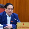 Thủ tướng Phạm Minh Chính chủ trì họp Thường trực Chính phủ về kiểm soát lạm phát. (Ảnh: Dương Giang/TTXVN)