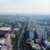 Việc siết phân lô bán nền khi Luật Kinh doanh bất động sản 2023 có hiệu lực sẽ giúp thị trường minh bạch, loại bỏ tình trạng sốt ảo. (Ảnh: Hồng Đạt/TTXVN)