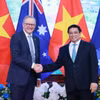 Thủ tướng Phạm Minh Chính và Thủ tướng Australia Anthony Albanese chụp ảnh chung trong buổi hội đàm ngày 4/6/2023. (Ảnh: Dương Giang/TTXVN)