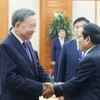 Tổng Bí thư Tô Lâm tiếp Thường trực Ban Bí thư Đảng Nhân dân Cách mạng Lào Bounthong Chitmany. (Ảnh: Thống Nhất/TTXVN)