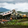 Hiện trường vụ tai nạn tàu hỏa tại Cicalengka, Tây Java, Indonesia, ngày 5/1/2024. (Ảnh: AFP/TTXVN)