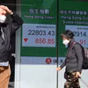 Bảng điện tử niêm yết chỉ số chứng khoán Hang Seng của Hong Kong (Trung Quốc). (Nguồn: AFP/TTXVN)
