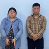 Đặng Thị Hoa (trái) và Tô Bá Nguyên tại cơ quan công an. (Nguồn: Cơ quan Công an)