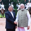 ​Thủ tướng Narendra Modi đón Thủ tướng Phạm Minh Chính​ thăm cấp Nhà nước đến Ấn Độ. (Ảnh: Dương Giang/TTXVN)