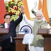 Thủ tướng Phạm Minh Chính​ và Thủ tướng Ấn Độ Narendra Modi sau khi kết thúc cuộc gặp gỡ báo chí hai nước. (Ảnh: Dương Giang/TTXVN)