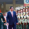 Thủ tướng Phạm Minh Chính duyệt đội danh dự. (Ảnh: Dương Giang/TTXVN)