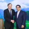 Thủ tướng Phạm Minh Chính tiếp ông David Petraeus Chủ tịch Viện toàn cầu Quỹ đầu tư Kohlberg Kravis Roberts. (Ảnh: Dương Giang/TTXVN)