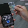 Dù có 13 triệu khách hàng đã hoàn thành sinh trắc học nhưng vẫn còn nhiều người gặp khó. (Ảnh: Vietnam+)