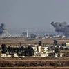 Khói bốc lên từ Kibbutz Ein Zivan, sau vụ không kích xuyên biên giới giữa Syria với Cao nguyên Golan. (Ảnh: The Times of Israel/TTXVN)