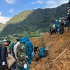 Công tác tìm kiếm người bị nạn tại xã Ca Thành, huyện Nguyên Bình. (Ảnh: TTXVN phát)