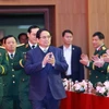 Thủ tướng Phạm Minh Chính thăm, chúc mừng cán bộ, giảng viên, học viên Học viện Quốc phòng. (Ảnh: Dương Giang/TTXVN)