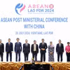 Các đại biểu chụp ảnh chung tại Hội nghị Bộ trưởng ASEAN với Trung Quốc. (Ảnh: TTXVN phát)