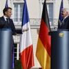 Tổng thống Pháp Emmanuel Macron (trái) và Tổng thống Đức Frank-Walter Steinmeier phát biểu trong cuộc họp báo chung sau cuộc hội đàm tại Dinh Tổng thống Bellevue ở Berlin, Đức ngày 26/5/2024. (Nguồn: AFP)