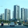 Khu căn hộ chung cư ở thành phố Thủ Đức nhìn từ đại lộ Võ Nguyên Giáp. (Ảnh: Hồng Đạt/TTXVN)