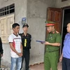 Cơ quan công an đọc lệnh bắt bị can Nguyễn Văn Trung. Ảnh: Viện kiểm sát nhân dân tỉnh Bình Thuận)