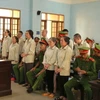 10 bị cáo bị tuyên phạt về tội hoạt động nhằm lật đổ chính quyền nhân dân. (Ảnh: Quang Thái- TTXVN)
