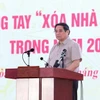 Thủ tướng Phạm Minh Chính phát động Phong trào thi đua “Xóa nhà tạm, nhà dột nát” trong cả nước. (Ảnh: Dương Giang/TTXVN)