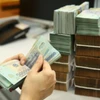 Tổng cục Thống kê thông tin tình hình thu ngân sách Nhà nước trong sáu tháng đầu năm đã tăng 15,7% so với cùng kỳ năm 2023. (Nguồn: TTXVN)