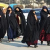 Phụ nữ Afghanistan tại thủ đô Kabul ngày 28/12/2022. (Ảnh: AFP/TTXVN)