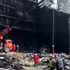 Hiện trường vụ tấn công tại nhà hát Crocus City Hall ở ngoại ô Moskva, Nga, ngày 26/3/2024. (Ảnh: AFP/TTXVN)