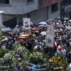 Tang lễ các nạn nhân của vụ xả súng hàng loạt ở thị trấn Chicomuselo của Mexico. (Ảnh: AP)