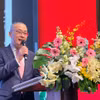 Đại sứ Vũ Quang Minh phát biểu Chúc mừng Năm mới tại Tết cộng đồng của người Việt tại Cộng hòa Liên bang Đức. (Ảnh: Phương Hoa/TTXVN)