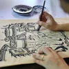 Tranh dân gian Đông Hồ thể hiện sinh động đời sống xã hội nông nghiệp Việt Nam cổ truyền với các phong tục, tập quán sinh hoạt. (Ảnh: TTXVN)