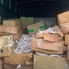 Một phần chân gà đông lạnh không rõ nguồn gốc bị phát hiện. (Ảnh: Công an huyện Yên Lập)