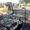Hiện trường một vụ tấn công do Boko Haram tiến hành nhằm vào đám tang ở gần thủ phủ Maiduguri của bang Borno, Nigeria. (Ảnh: AFP/TTXVN)