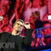 George Michael biểu diễn trong buổi hòa nhạc tại sân vận động Olympic Athens ở Athens, Hy Lạp ngày 26/7/2007. (Nguồn: EPA/TTXVN)
