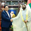 Thủ tướng Phạm Minh Chính hội đàm với Phó Tổng thống, Thủ tướng UAE Sheikh Mohammed bin Rashid Al Maktoum. (Ảnh: Dương Giang/TTXVN)